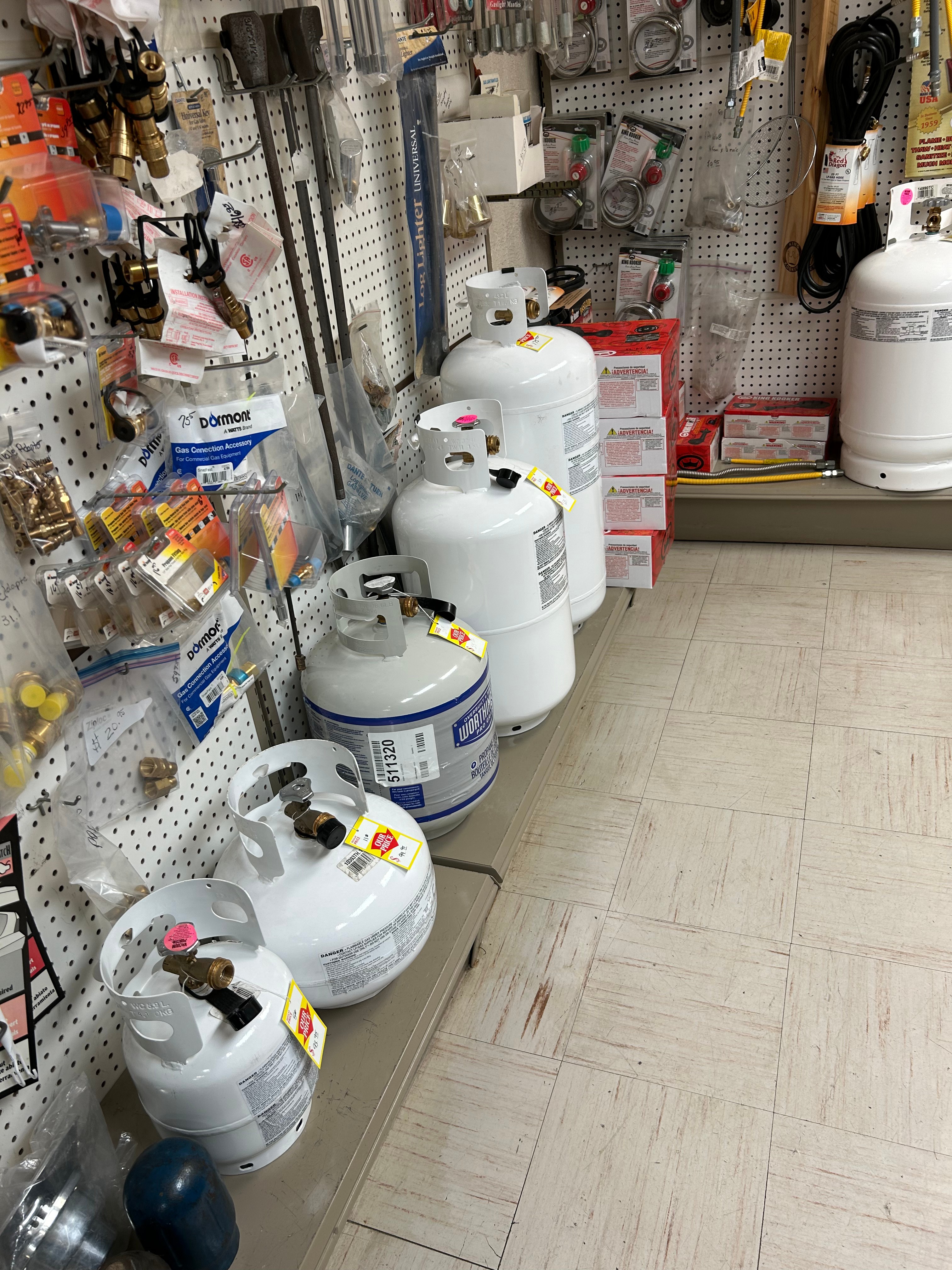 Propane cylinders and fittings available at Action Propane storefront, Leander TX